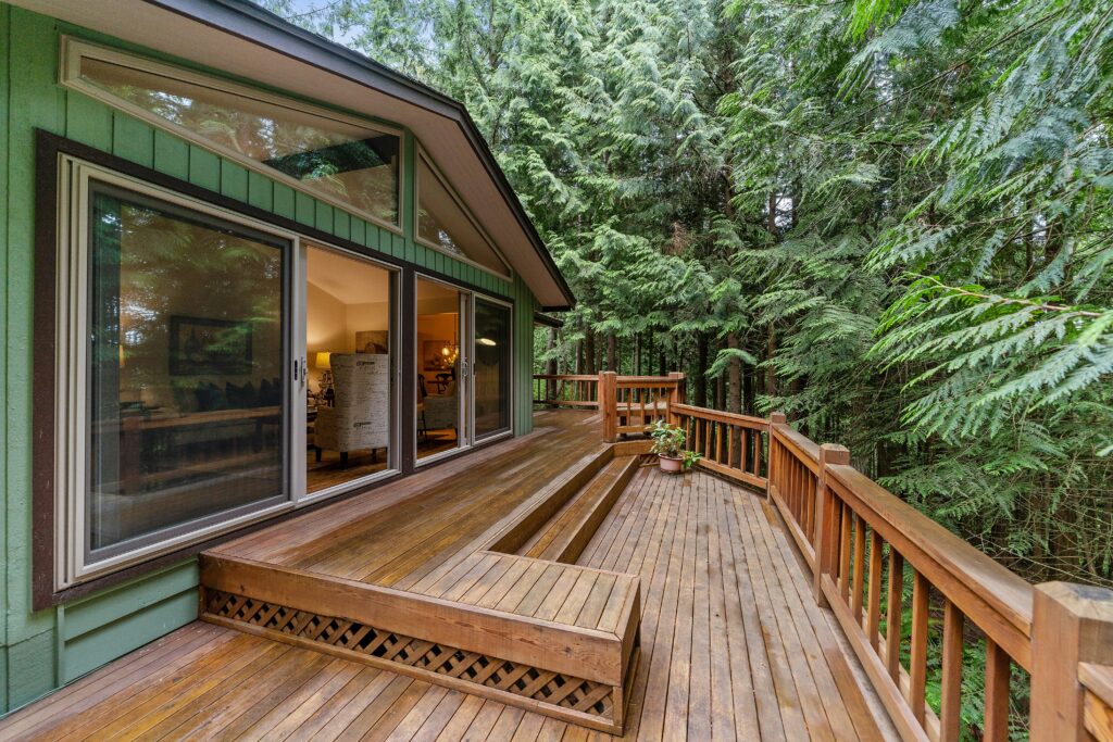Brown wooden terrace outside clear glass door stockpack unsplash